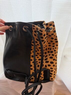 Bucket bag with straps for backpack